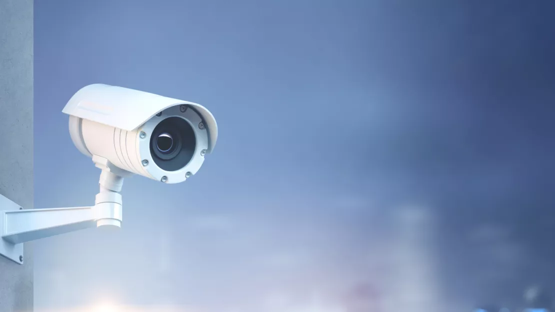 Modern CCTV camera on a wall.jpg